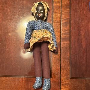 Handmade black polish doll